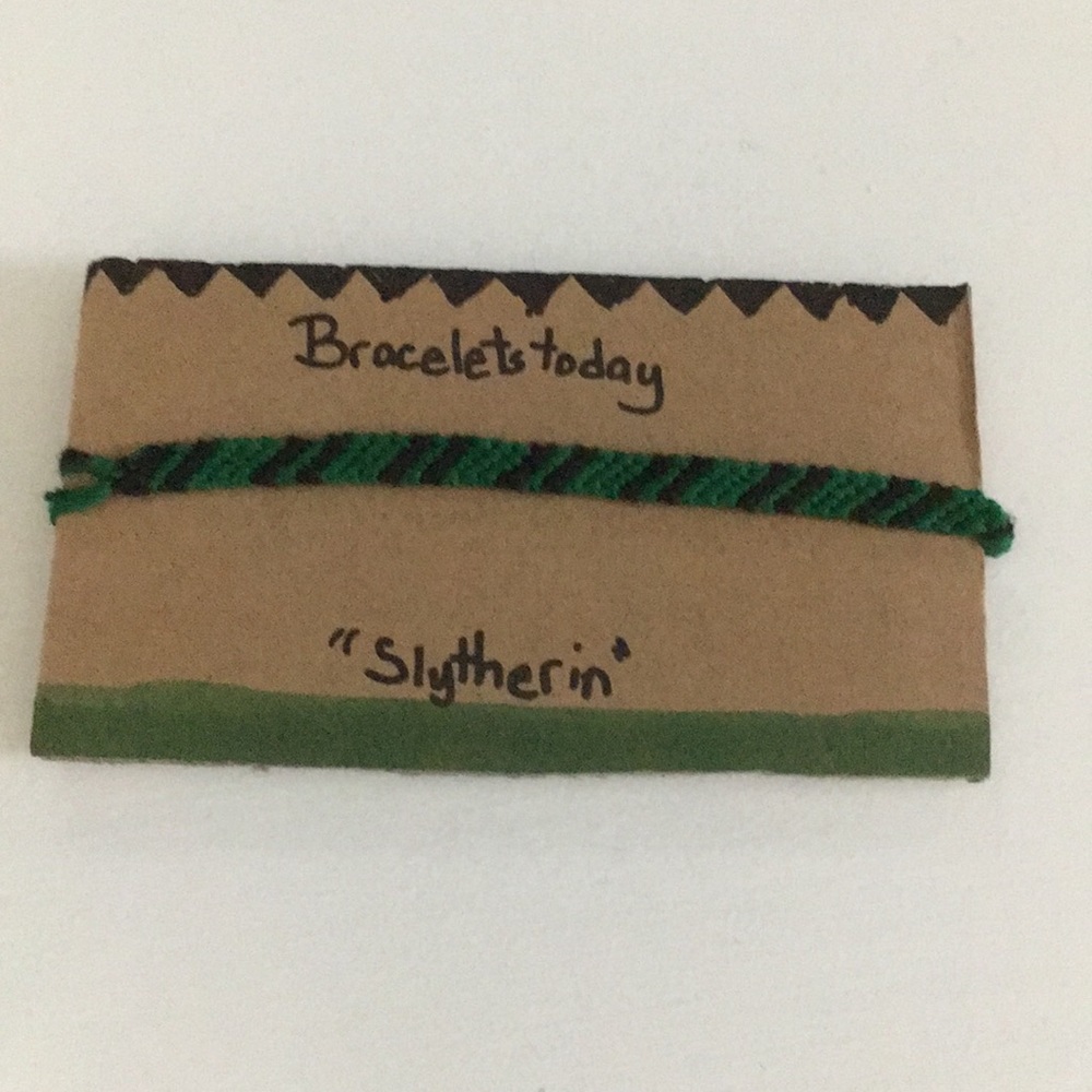 A handmade Harry Potter Slytherin bracelet.